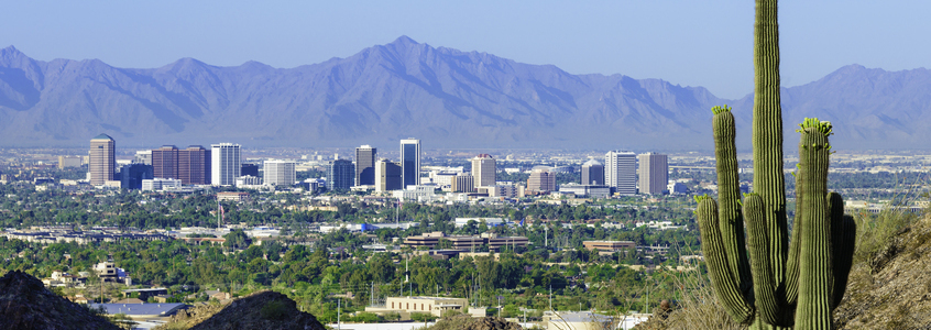 Phoenix skyline framed by saguaro cactus and mountainous desert Clearinghouse Activates eTranscripts on PowerCampus by Ellucian