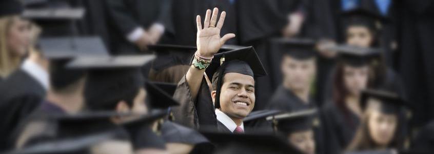 College graduate waving graduate silhouette 2019 2020